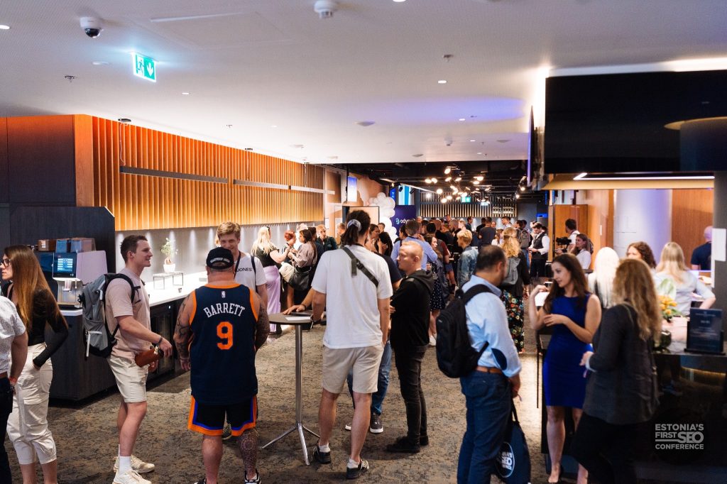 Participants networking at the conference venue
